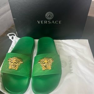 Woman’s Versace Slides